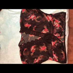 Sheer blouse with flower motif.